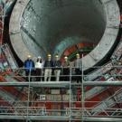 UC Davis scientists Mike Case, Robin Erbacher, Aron Soha, John Conway, Richard Breedon and Maxwell Chertok tour the Compact Muon Solenoid cavern in 20