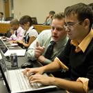 Photo: Daniel Raff, left, and Brian Eller, both third-year law students, carry out fact-checking during the debate, as part of the Truth Team.