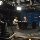 Chemist Matthew Augustine, left, talks with Paul Pfotenhauer, Frontiers host and producer, as they prepare for an interview on Augustine&rsquo;s  liquid explosives research.