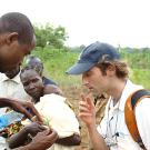 Michael Wolff, a UC Davis graduate student, right, discusses weeds with a volunteer in Kenya during a horticulture project in Kenya.