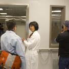 Lisa Miller, associate professor, School of Veterinary Medicine, talks with a news reporter.