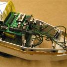 Photo: Part of a motorized vehicle with many wires