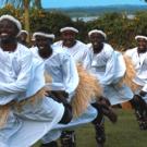 Spirit of Uganda uses drums and other percussion instruments, stirring call-and-response vocals, vibrant and colorful costumes, and dramatic choreogra