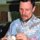 Photo: man examining shell