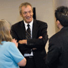 UC President Bob Dynes, center, talks with members of the UC Davis faculty and staff, including Academic Senate chair Linda Bisson, left, and Edwin Arevalo, assistant director of the Academic Senate office.  Dynes has promised UC will turn out 1