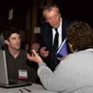 At the World of Ideas Cafe: UC President Bob Dynes is flanked by graduate student Dan MacDonald and Folsom Lake College Professor Alice Textor, as they discuss residential carbon emission reduction.
