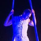 Photo: Acrobat under the awning of the Mondavi Center for the Performing Arts