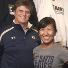 Photo: Professor Andr&eacute; Knoesen, vice chair, Academic Senate; and Lina Layiktez, chair, Staff Assembly &mdash; both wearing Aggie gear.