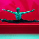 Dancer does splits in the air.