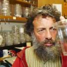 Photo: Man staring into cup