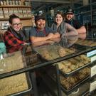 The Coffee House management team poses for a photo.