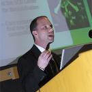 Photo: man talking at podium