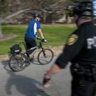 Photo: Campus police officer Ralph Nuno observes fellow officer Jason Barrera during a bicycle officer training class.