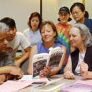 Those helping with the book project include, left to right seated, Carl Jorgensen, Karen Roth and Alison Kent, and, standing, Gabriel Bang, Wendy Yu, Gabe Koulikov, Anita Poon and Lynn Narlesky.