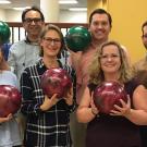 Six bowlers, group photo, holding bowling balls