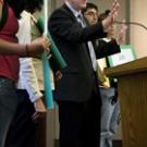 With protesters behind him, Chancellor Larry Vanderhoef speaks to the crowd at the May 3 brown bag chat.