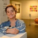 Ellen Caminiti at an exhibit her student group organized