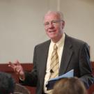Chancellor Larry Vanderhoef talks with staff and faculty members Monday during a lunchtime brown bag session in the Silo. 