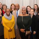 Team poses with Chancellor Gary S. May.