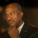 Chancellor Gary S. May looks to the left.