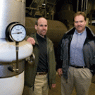 Come summer, UC Davis can thank utilities associate director Chris Cioni, left, and project manager Scott Arntzen for making quick work of an upgrade to the campus&rsquo;s cooling system. New, energy-saving chillers earned a $1.25 million PG&E rebat