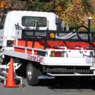 Cone placement and retrieval vehicle.