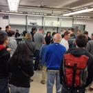 Photo: Crowd of potential bidders inside Aggie Surplus