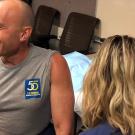 David Lubarsky gets a flu shot.