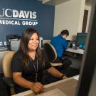 Photo: Jo Ena Christensen and Hugo Casillas Jimenez behind the counter at the Davis Clinic