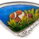 Clownfish pin (approximately 2 inches by 1.5 inches), crafted by Olga Barmina, a staff research associate in the Department of Evolution and Ecology.