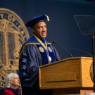 Chancellor Gary S. May in commencement regalia, speaking at commencement.