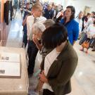 People look at the Golden Memory Book.