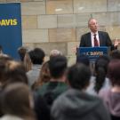 Interim Chancellor Ralph J. Hexter speaks to a crowd.