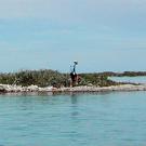 Photo: man on island