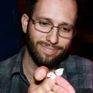 Jacob Montgomery with the cabbage white butterfly he caught.