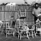 Photo: Ralph Johnson stages his artistic chairs.