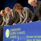 Photo: Linda P.B. Katehi and others signing at table