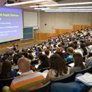 Photo: Students fill lecture hall.