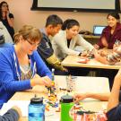 Students build Lego boats.