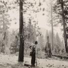 Photo: old photo of man in hat in forest