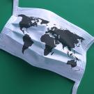 A world map printed on a facial mask