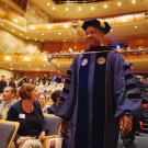 Chancellor May in cap and gown, in the processional