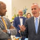 Chancellor Gary S. May listens as Darrell Steinberg speaks.