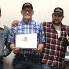 Meat Lab team with championship trophy and certificate