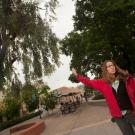 Melanie Gentles stands under eucalyptus tree.