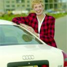 Photo: UC Merced Chancellor Carol Tomlinson-Keasey stands by her car with the Kolligan Library in the background.