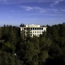 Photo" Mrak Hall, amid sea of trees