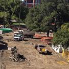 Photo: Tractors and dump trucks at construction site