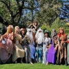 Students dressed as mythical gods and goddesses in costumes from the Department of Theatre and Dance.