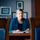 Janet Napolitano behind desk